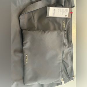 Tumi “Just In Case” black travel luggage bag